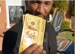 Prophet Passion Java Twabamholding fake Gold Coated 100 dollar bills