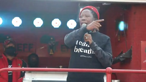 Julius Malema addressing party members outside the US Embassy in Pretoria