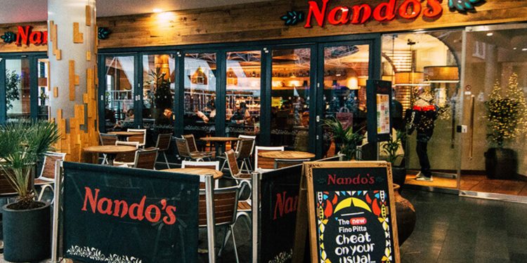 nandos workers remove expiry stamps