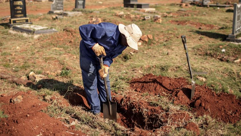 South Africa family did up grave remove plastic covid-19