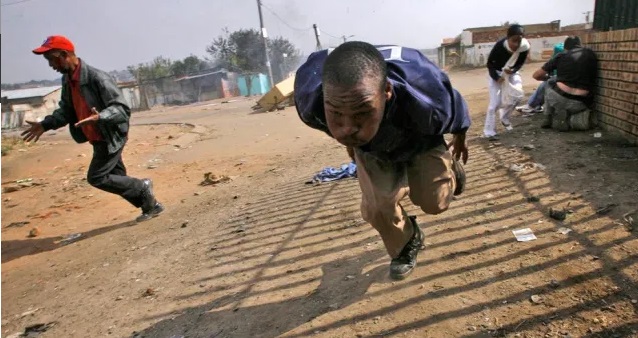 SAPS Showered Lockdown Level 3 defiant With Bullets In a Standoff