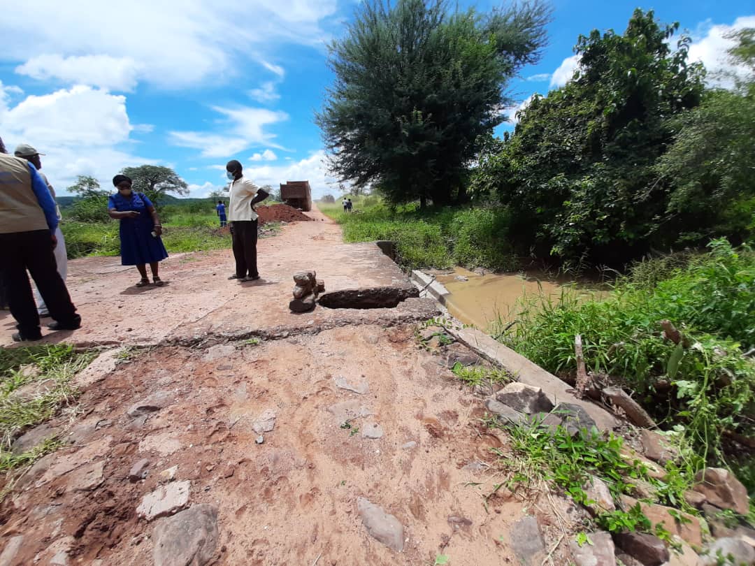 Another road collapses plunging two cars and a motorcycle into the sinkhole