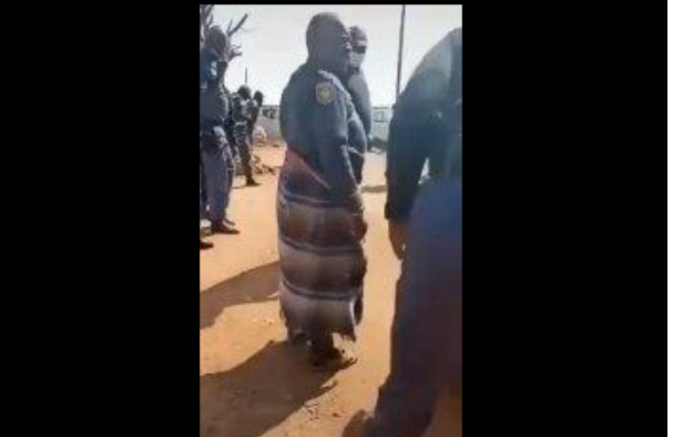 Video: Old gogo posing as a police officer arrested for selling alcohol during lockdown