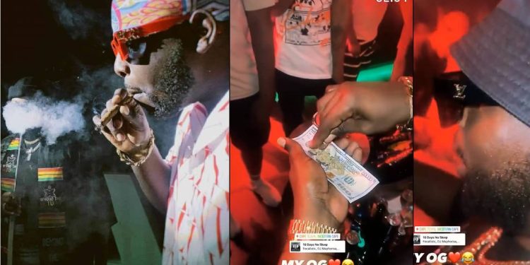 Watch: DJ Maphorisa uses 100 US Dollar Note for his weed