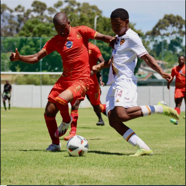 Royal AM player (left) tussles for the ball with Stellenbosch player. Credit: twitter.com/StellenboschFC/