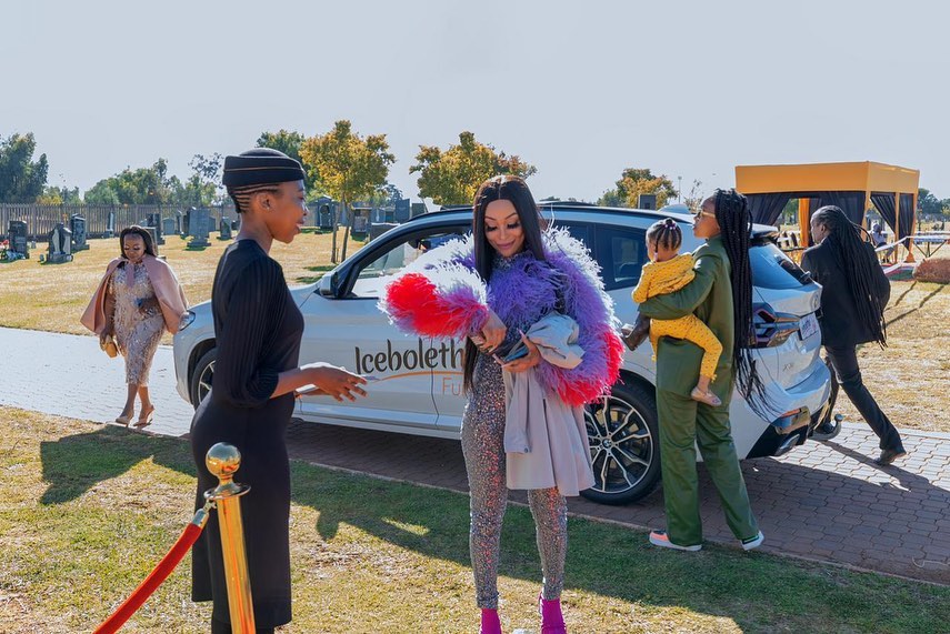 Khanyi Mbau at her father's tombstone unveiling