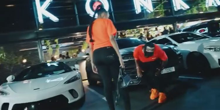 Andile Mpisane and pregnant wife Tamia dancing outside Konka