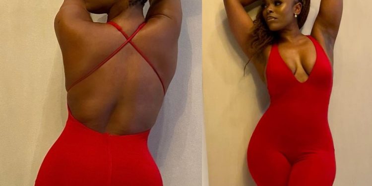 Unathi Nkayi showcases her summer body in a red back-out jumpsuit showing all curves