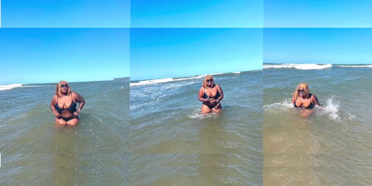 Watch: Sangoma Gogo Maweni shows off her body at the beach wearing a bikini