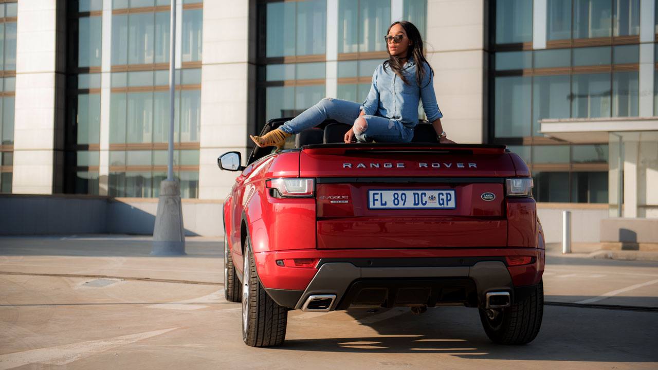 Thando Thabethe with a Range Rover