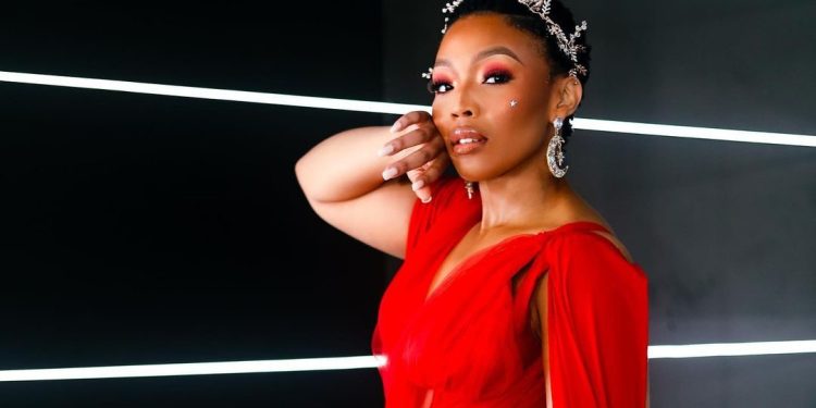 Gaisang wearing a gorgeous red dress