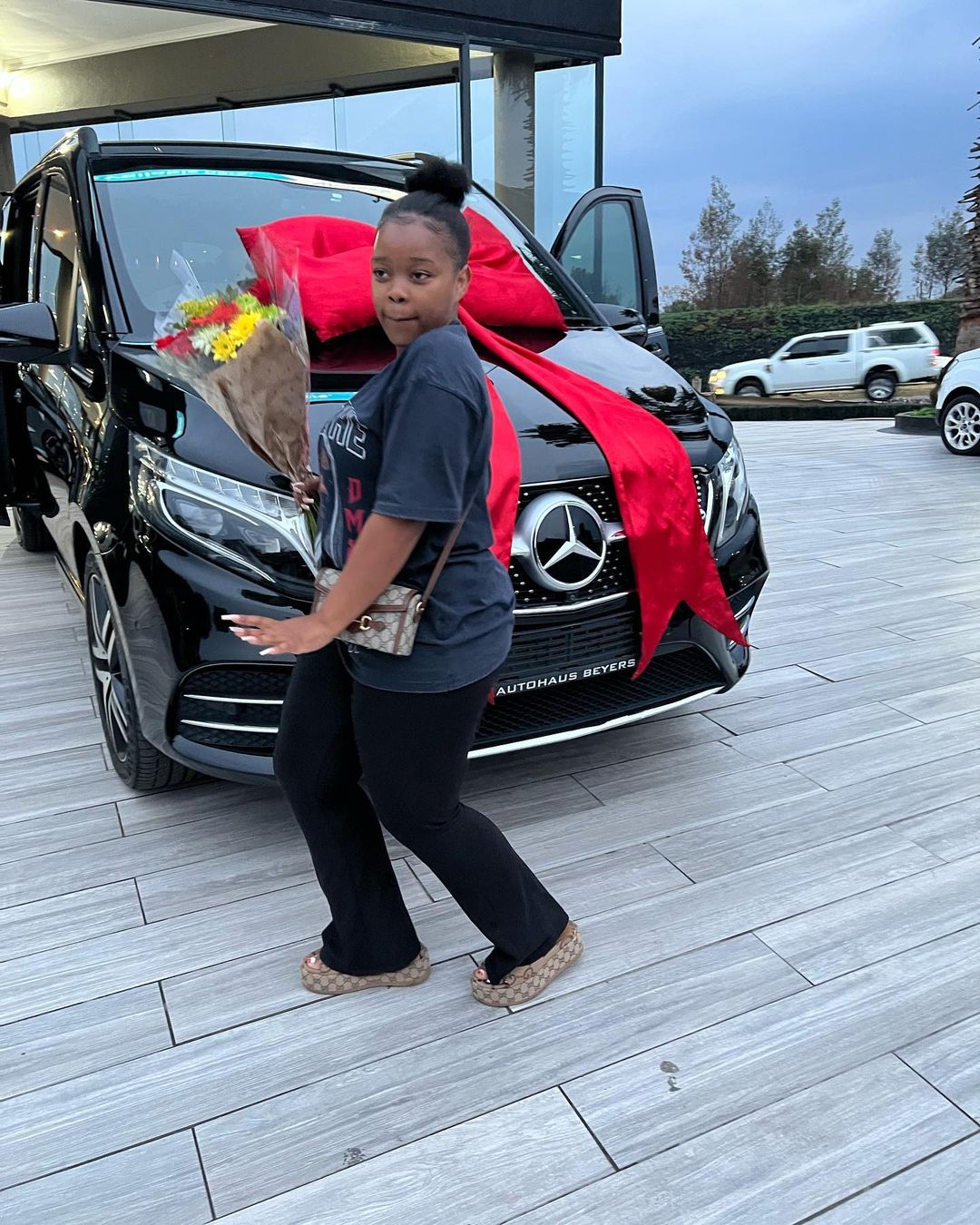 Boohle next to her new whip