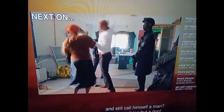 Mthambisi turns into the devilish Putin and TKO's Njinji by hitting her on the head with a gun tonight on Uzalo