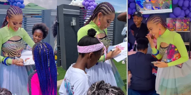 Sho Madjozi surprises young girls with her book at Lady Du’s salon